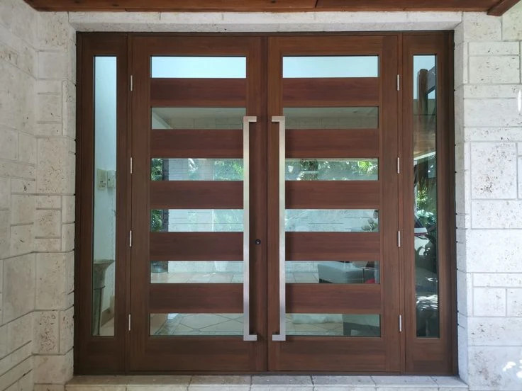 Hurricane impact double French door with sidelights installation in Boca Raton, Florida by East Blue Windows & Doors.