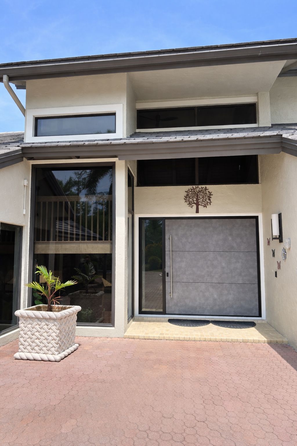Impact windows and doors replacement in West Palm Beach, Florida by East Blue Windows & Doors.